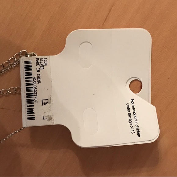 NWT Charming Charlie Dainty Sideways Silver Cross - Picture 5 of 8